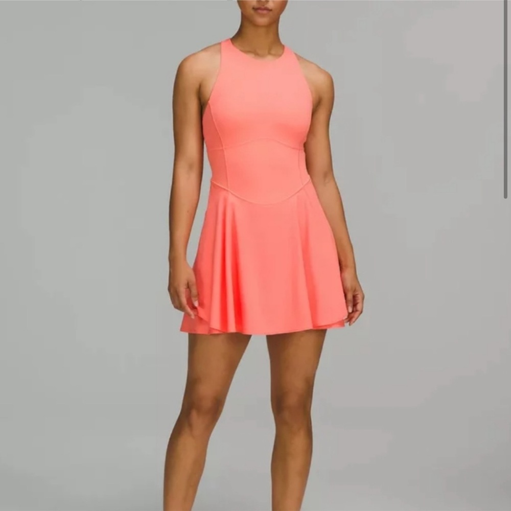 Lululemon dress- size 12. Orange with tan liner